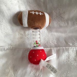 Plush football with baby rattle